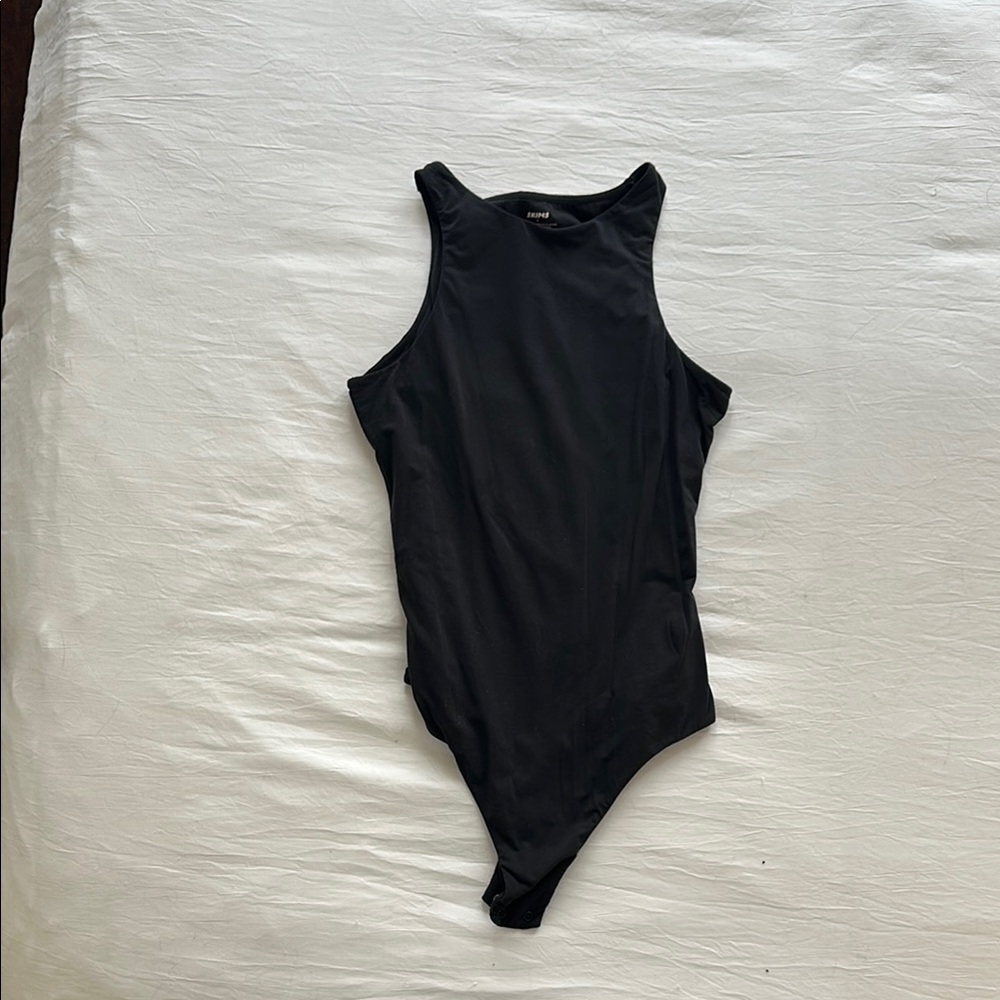 SKIMS Black body suit